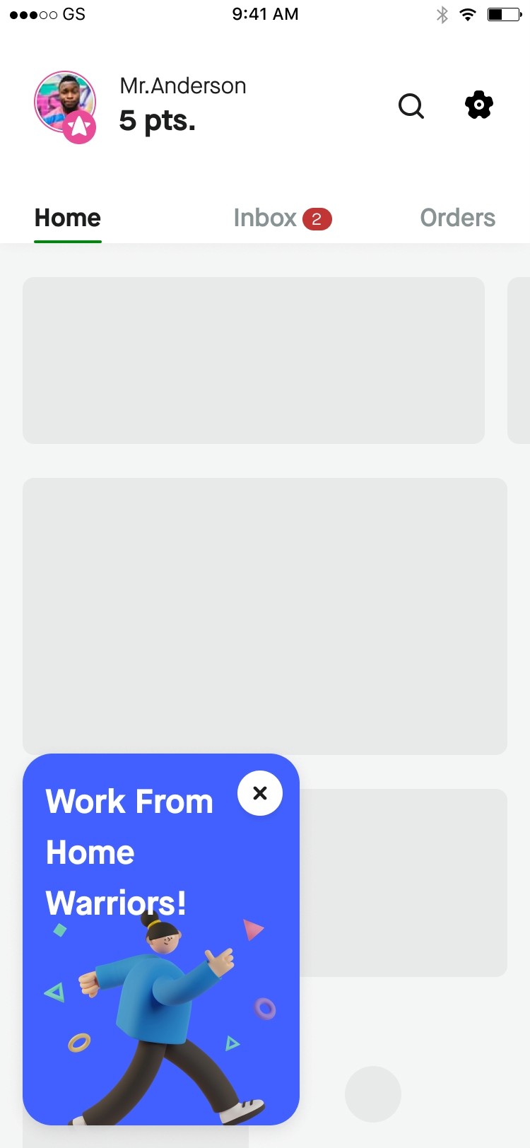 App screen with grey placeholder blocks and a blue "Work From Home Warriors!" promo card overlaid at the bottom